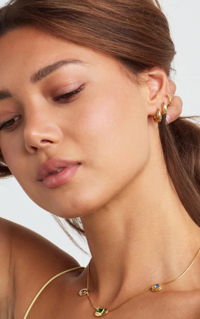 Model in Bixby and Co earring stack 