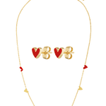 Gold necklace and earrings with red enamel heart details